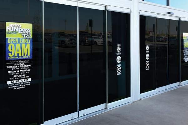 all-glass-biparting-sliding-automatic-doors-with-full-breakout-capability