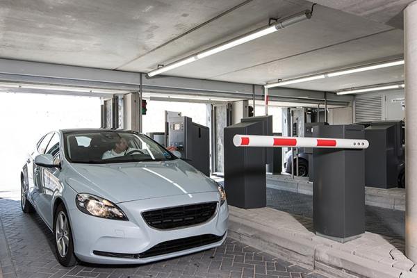 driver-uses-parking-control-and-parking-revenue-system-in-parking-garage