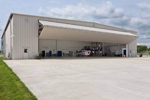 bi-folding-overhead-door-for-helicopter-hangar